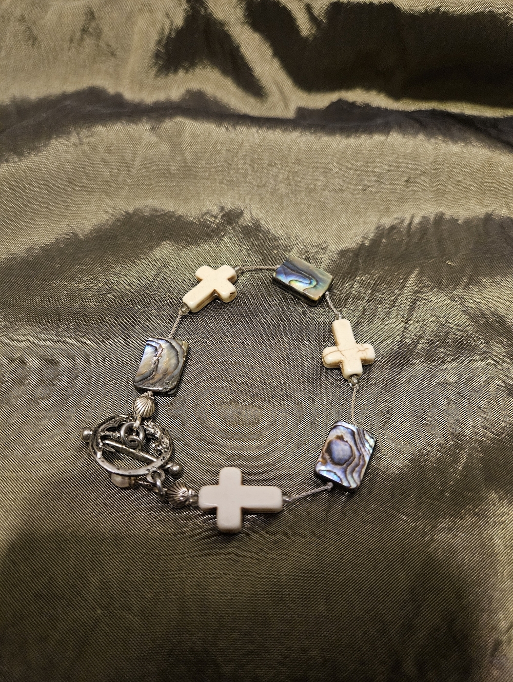 Cross & Abalone Shell Bracelet in Cream and Iridescent Blue.